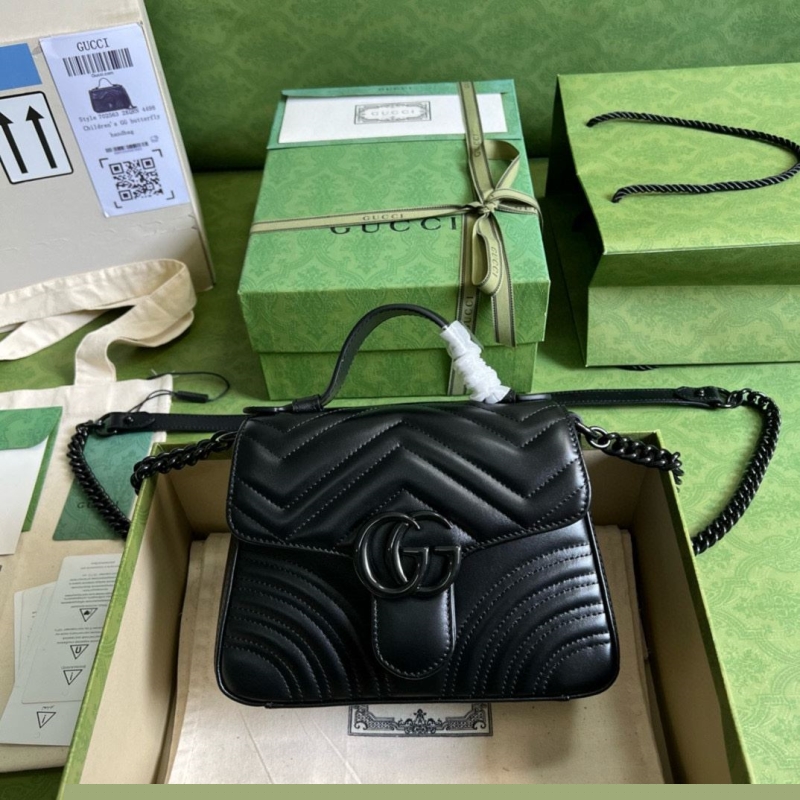 G*u*i top handle bags